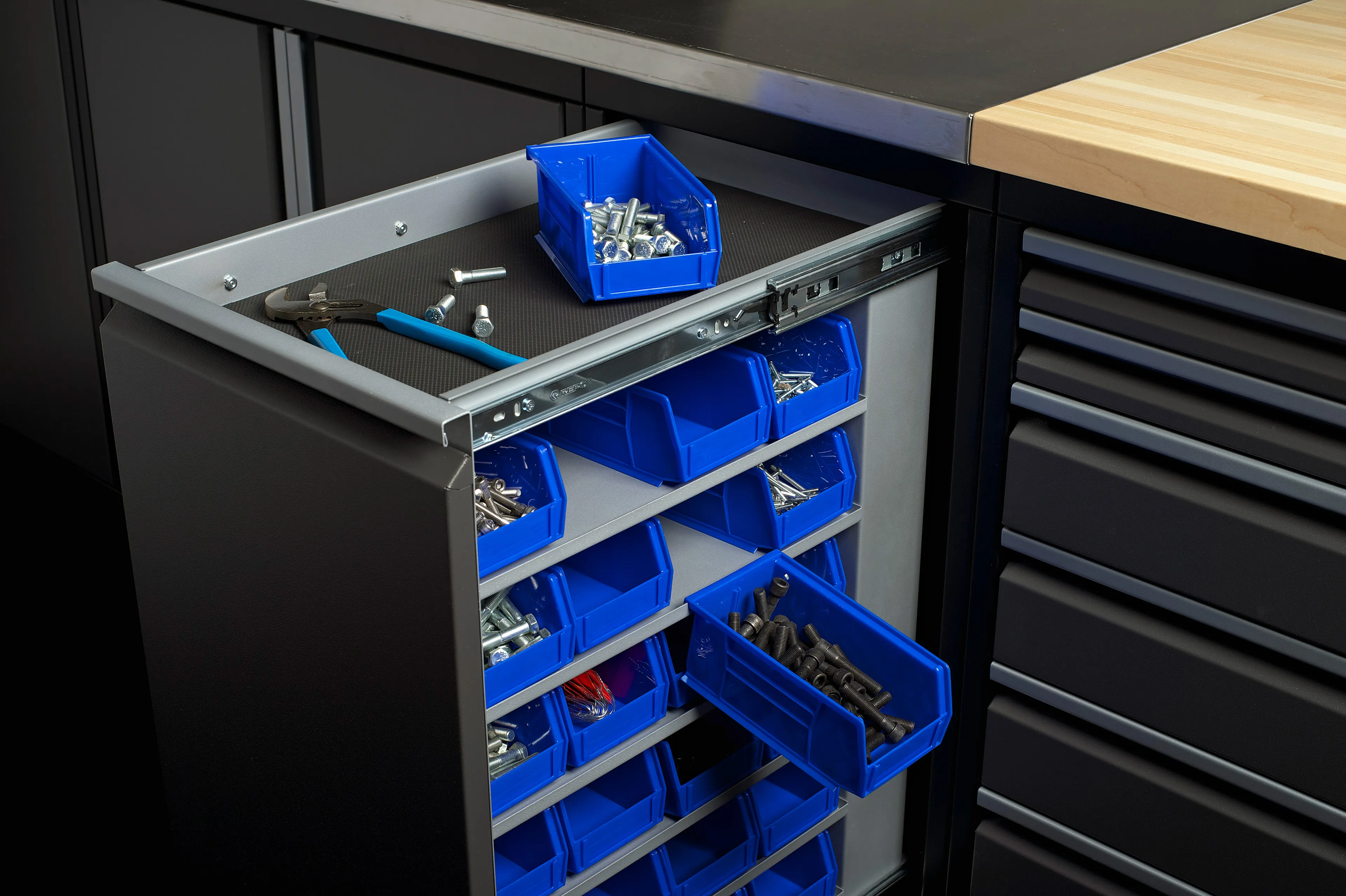 Utility Drawer Cabinet Image, illustrating the design of a utility drawer cabinet with a sleek, modern look, featuring a combination of drawers and cabinets for efficient storage and organization.